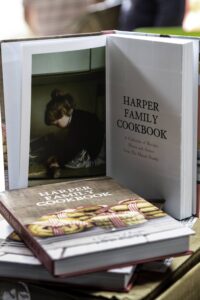 The Harper Family Cookbook stacked proudly