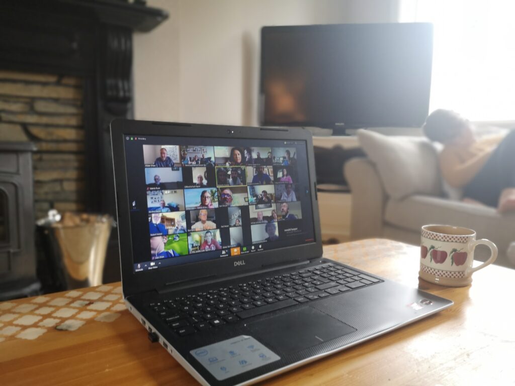The Harper Family virtual reunion on a laptop