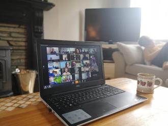 The Harper Family virtual reunion on a laptop